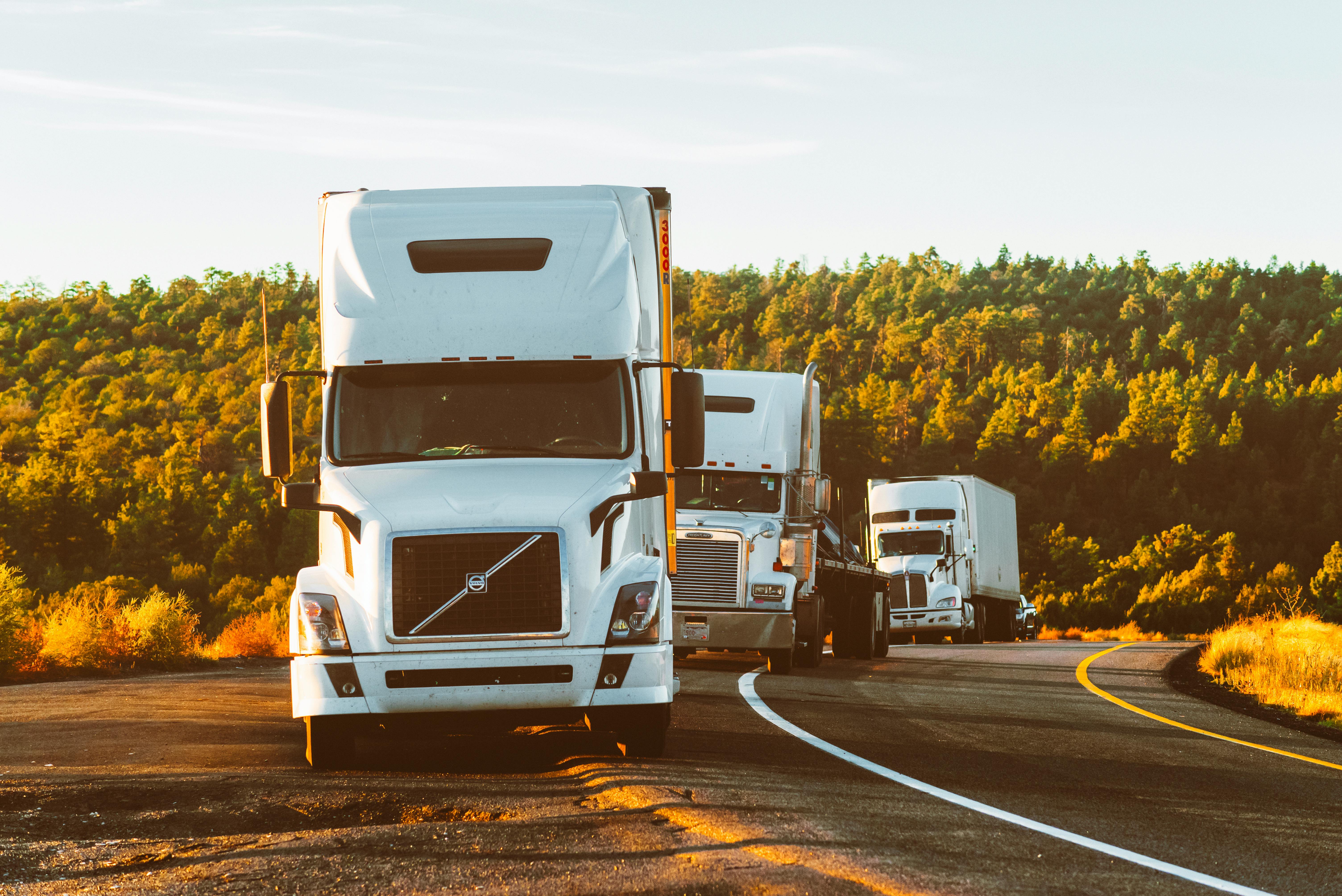 Fleet of trucks at sunset